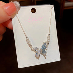 Close-up of the pendant and clasp on the Butterfly Pearl Necklace