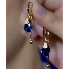 Close-up detail of the sparkling zircons and plating on the Water Drop Earrings