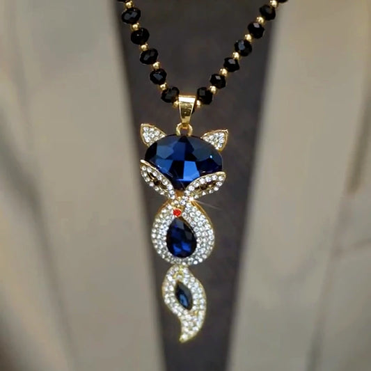 14K Gold-Plated Blue Fox Pendant Necklace worn to showcase its length and pendant detail