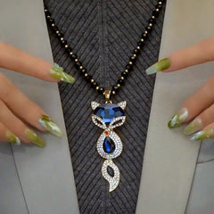 Close-up of the pendant and clasp on the Fox Pendant Necklace