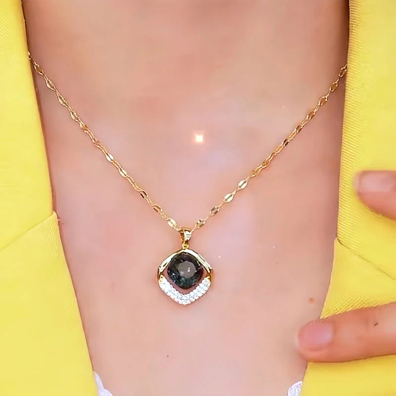 Close-up of the pendant and clasp on the Geometric Crystal Necklace