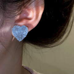 Close-up detail of the sparkling zircons and plating on the Crystal Heart Studs