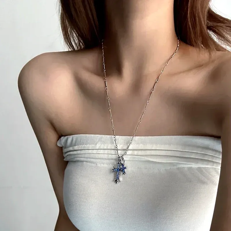 14K Gold-Plated Blue Zircon Diamond Cross Necklace worn to showcase its length and pendant detail