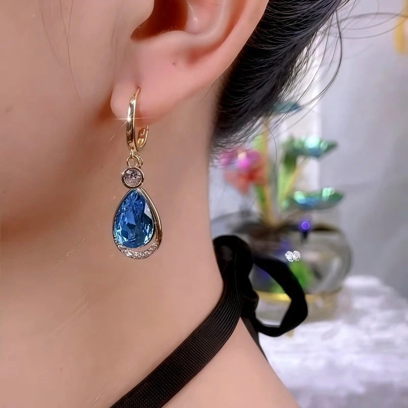 Close-up detail of the sparkling zircons and plating on the Blue Water Drop Earrings