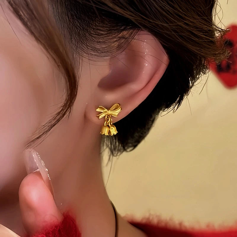 Close-up detail of the sparkling zircons and plating on the Orchid Flower Earrings