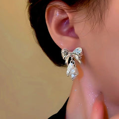 Close-up detail of the sparkling zircons and plating on the Pearl Tassel Earrings