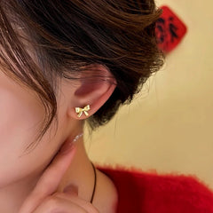 Close-up detail of the sparkling zircons and plating on the Red Bead Earrings