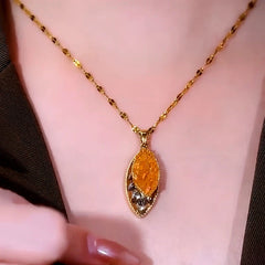 Close-up of the pendant and clasp on the Leaf Pendant Necklace