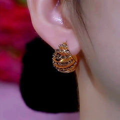 Close-up detail of the sparkling zircons and plating on the Double-Sided Earrings