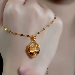 14K Gold-Plated Brown Diamond Cat's Eye Stone Heart Pendant Necklace worn to showcase its length and pendant detail