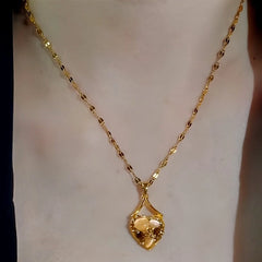Close-up of the pendant and clasp on the Heart Pendant Necklace