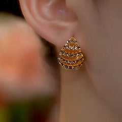 Close-up detail of the sparkling zircons and plating on the Double-Sided Hoops