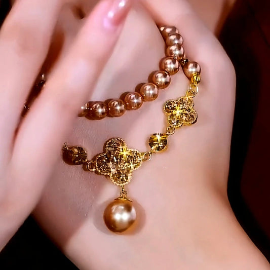 14K Gold-Plated Brown Diamond Four-Leaf Flower Bead Necklace worn to showcase its length and pendant detail