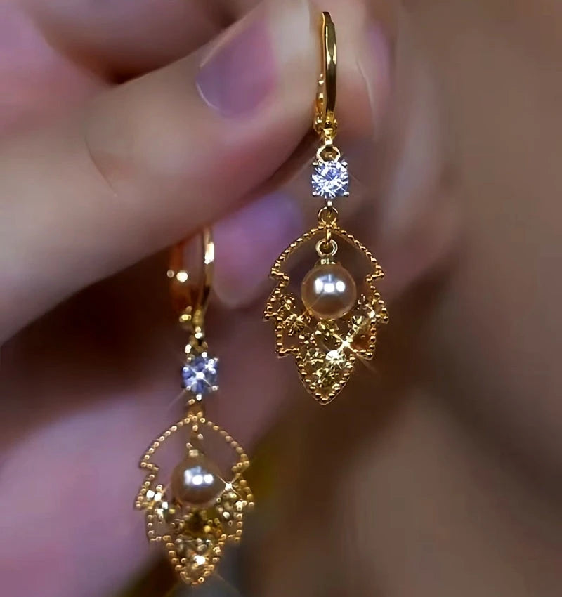 Close-up detail of the sparkling zircons and plating on the Diamond Leaf Earrings