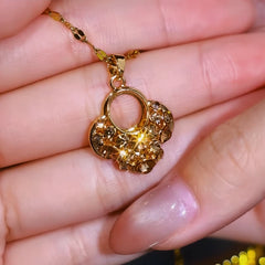 Close-up of the pendant and clasp on the Diamond Pendant Necklace