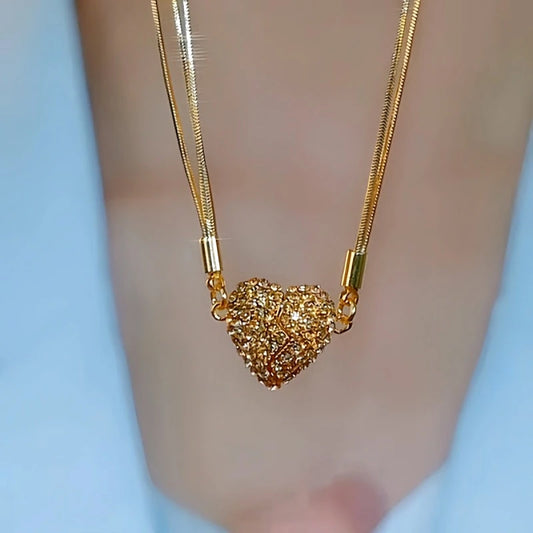 14K Gold-Plated Brown Magnetic Heart Necklaces worn to showcase its length and pendant detail