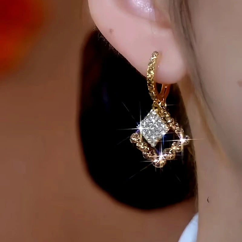 Close-up detail of the sparkling zircons and plating on the Brown Zircon Earrings