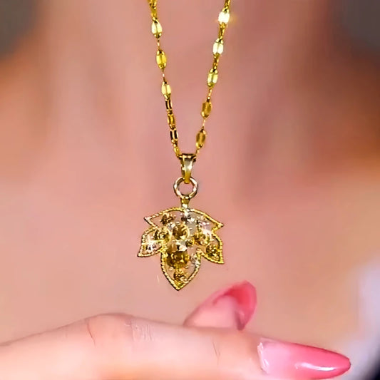 14K Gold-Plated Brown Zircon Diamond Maple Leaf Necklace worn to showcase its length and pendant detail