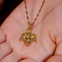 Detailed view of the 14K Gold-Plated Brown Zircon Diamond Maple Leaf Necklace chain and pendant