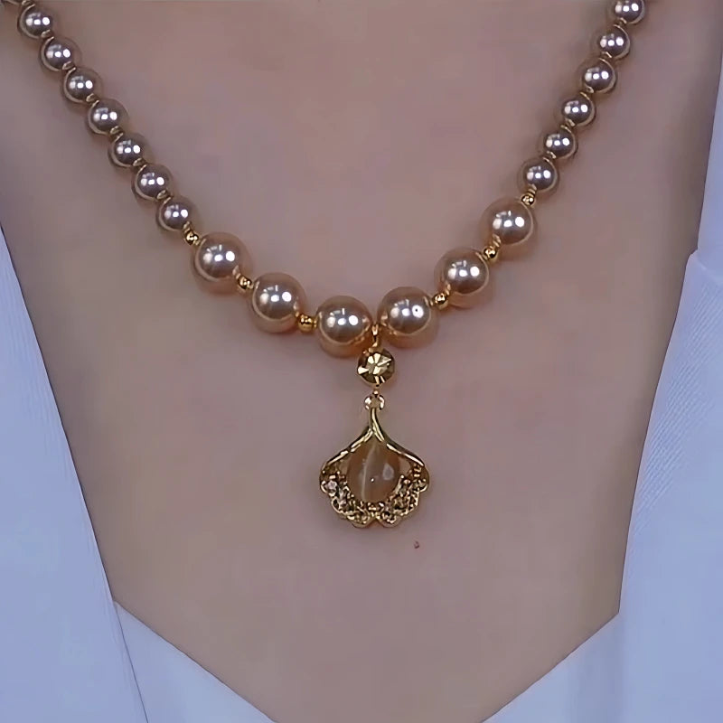 Close-up of the pendant and clasp on the Ginkgo Leaf Necklace