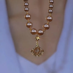 14K Gold-Plated Brown Zircon Ginkgo Diamond Leaf Pearl Necklace worn to showcase its length and pendant detail