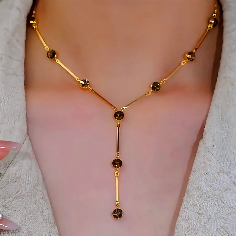 Detailed view of the 14K Gold-Plated Brown Zircon Necklace chain and pendant