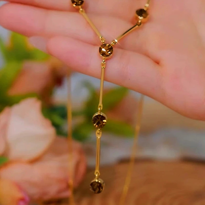 Close-up of the pendant and clasp on the Brown Zircon Necklace