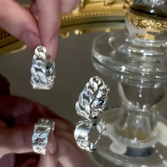 Close-up detail of the sparkling zircons and plating on the Brushed Chain Earrings