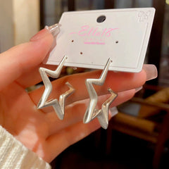 Styling the Star Earrings for a chic and modern look