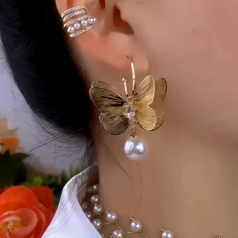 Close-up detail of the sparkling zircons and plating on the Butterfly Pearl Earrings