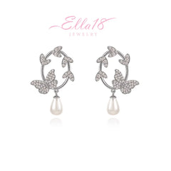 Angled view of the 14K Gold-Plated Butterfly Pearl Earrings