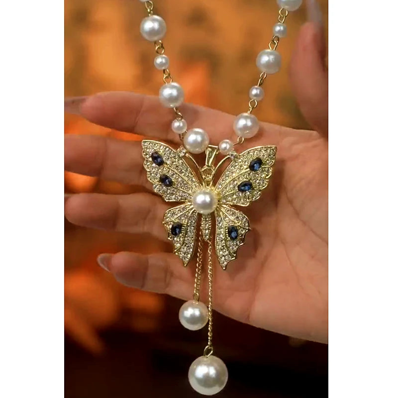 14K Gold-Plated Butterfly Pearl Necklace worn to showcase its length and pendant detail