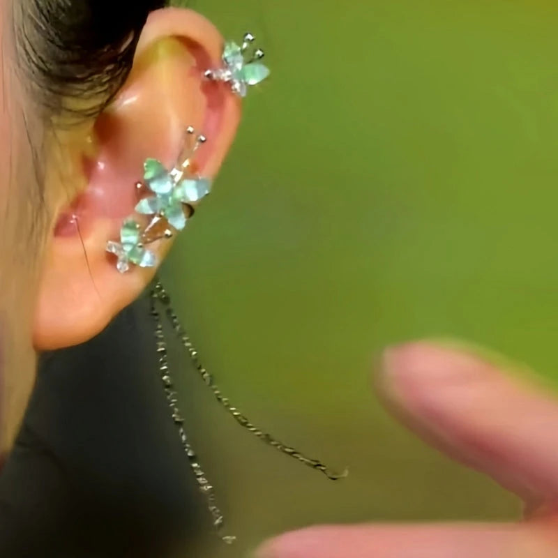 Model showcasing the dangle and style of the 14K Gold-Plated Butterfly Tassel Ear Cuffs ( 1 Pair )