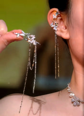 Close-up detail of the sparkling zircons and plating on the Tassel Ear Cuffs