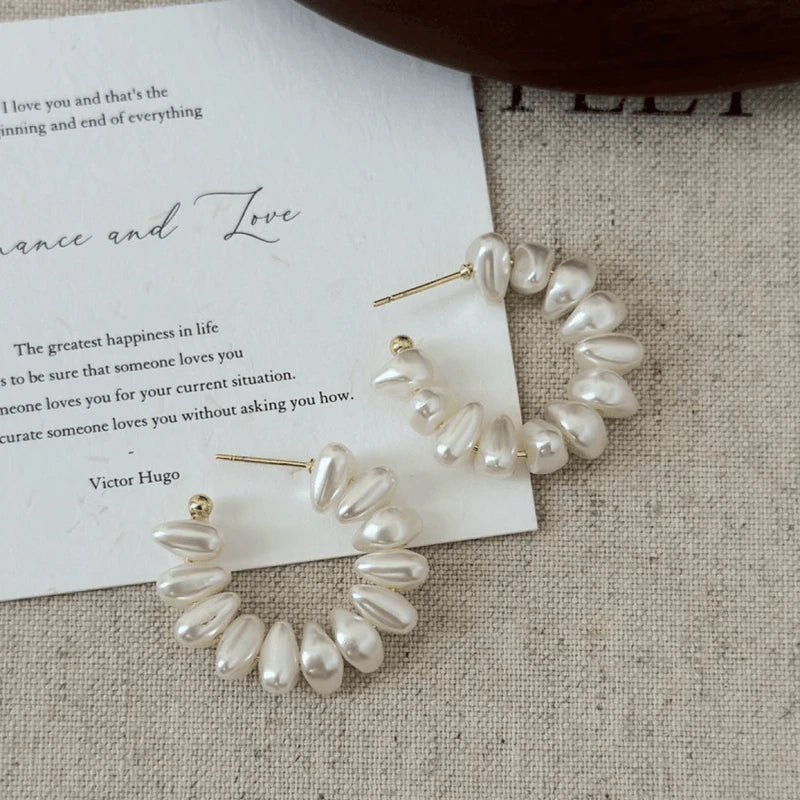 Close-up detail of the sparkling zircons and plating on the C-Shaped Bead Earrings