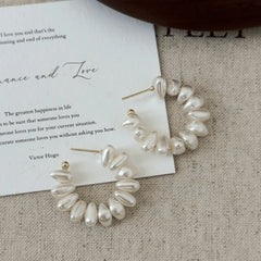 Close-up detail of the sparkling zircons and plating on the C-Shaped Bead Earrings