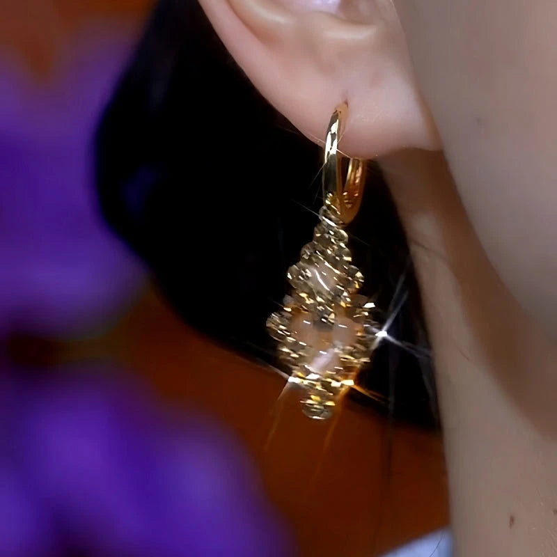 Close-up detail of the sparkling zircons and plating on the Leaf Earrings