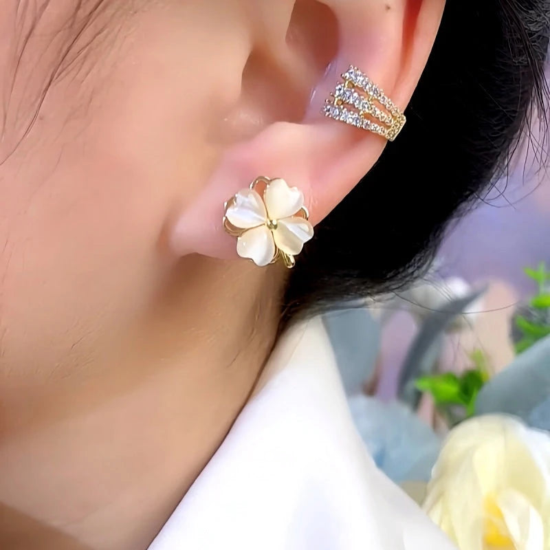 Close-up detail of the sparkling zircons and plating on the Rotatable Stud Earrings