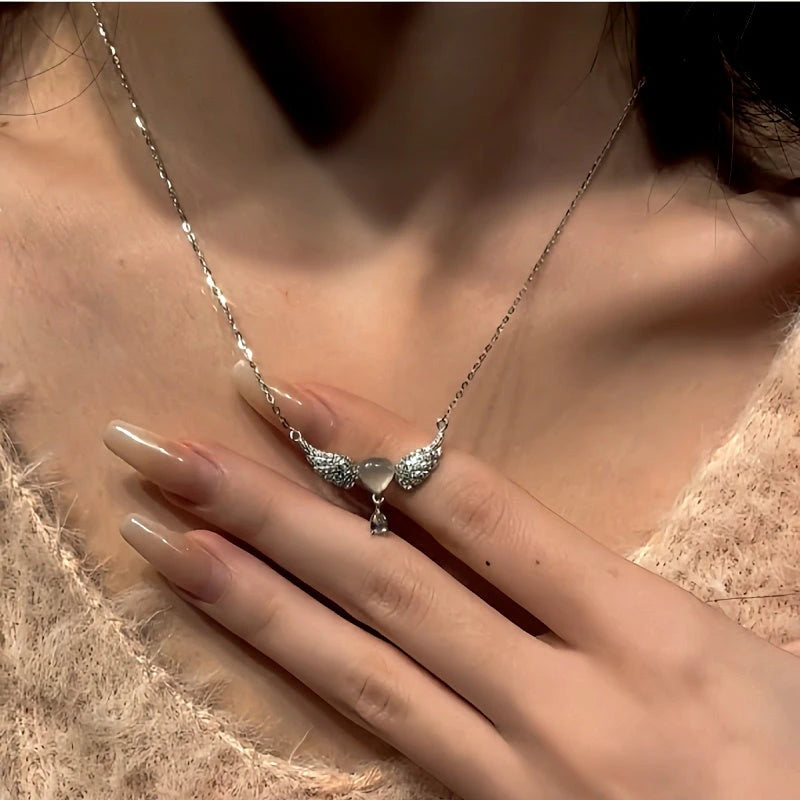 Close-up of the pendant and clasp on the Angel Wing Necklace