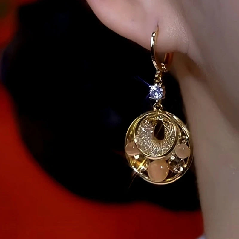 Close-up detail of the sparkling zircons and plating on the Rose Circle Earrings