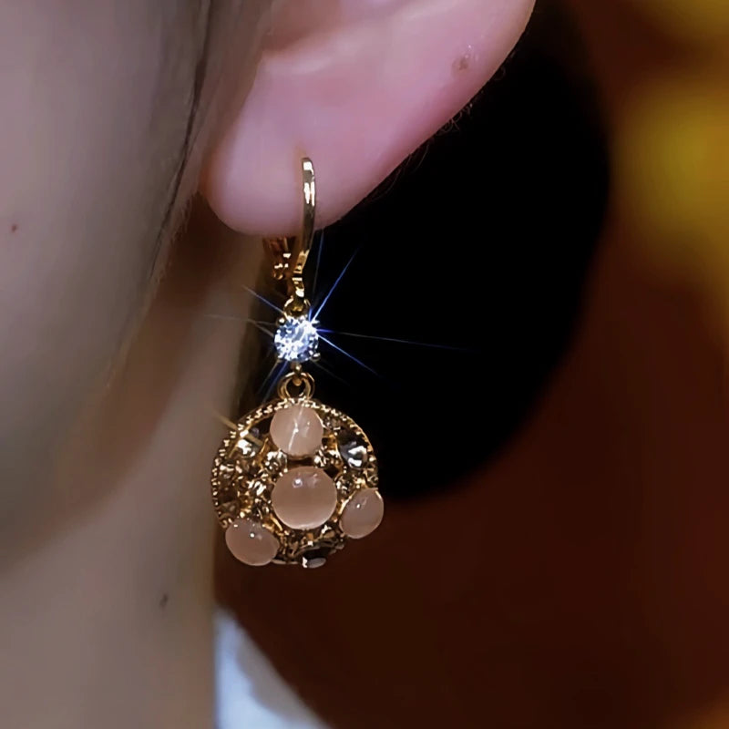Close-up detail of the sparkling zircons and plating on the Water Drop Earrings