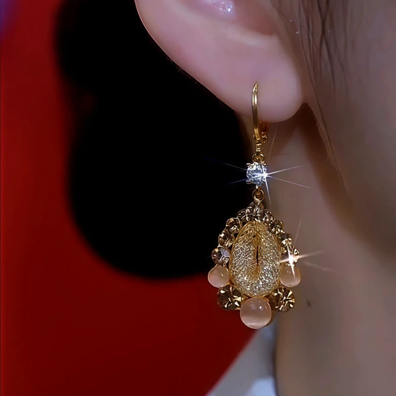 Close-up detail of the sparkling zircons and plating on the Water Drop Earrings
