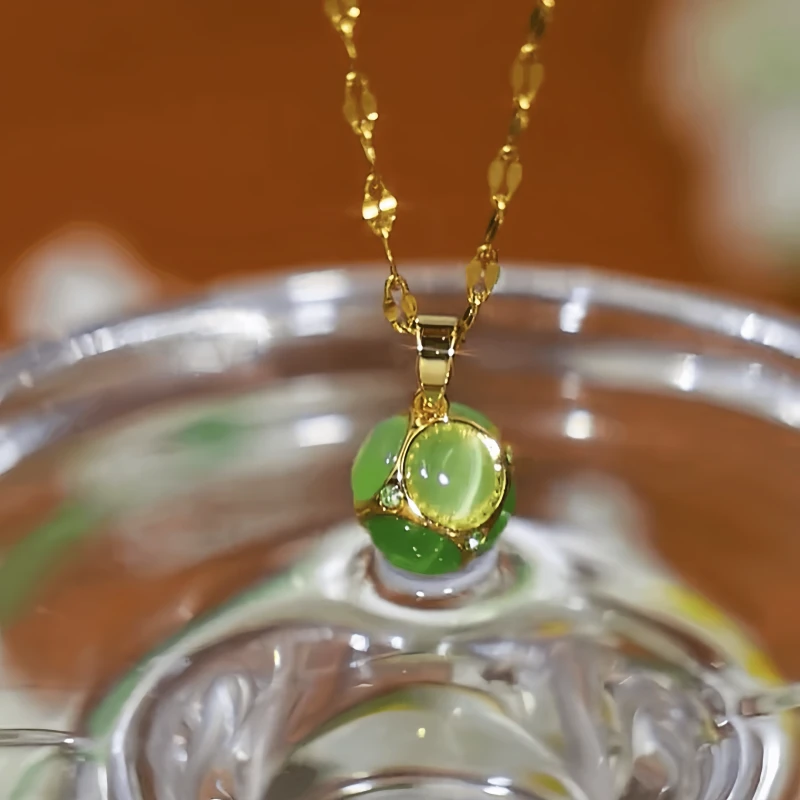 14K Gold-Plated Cat's Eye Stone Green Ball Necklace worn to showcase its length and pendant detail