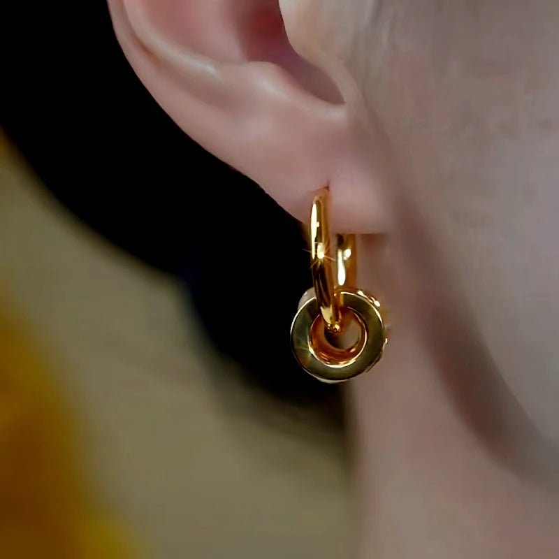 Close-up detail of the sparkling zircons and plating on the Cat's Eye Hoop Earrings
