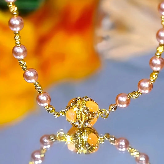 14K Gold-Plated Cat's Eye Stone Magnetic Pearl Necklace worn to showcase its length and pendant detail