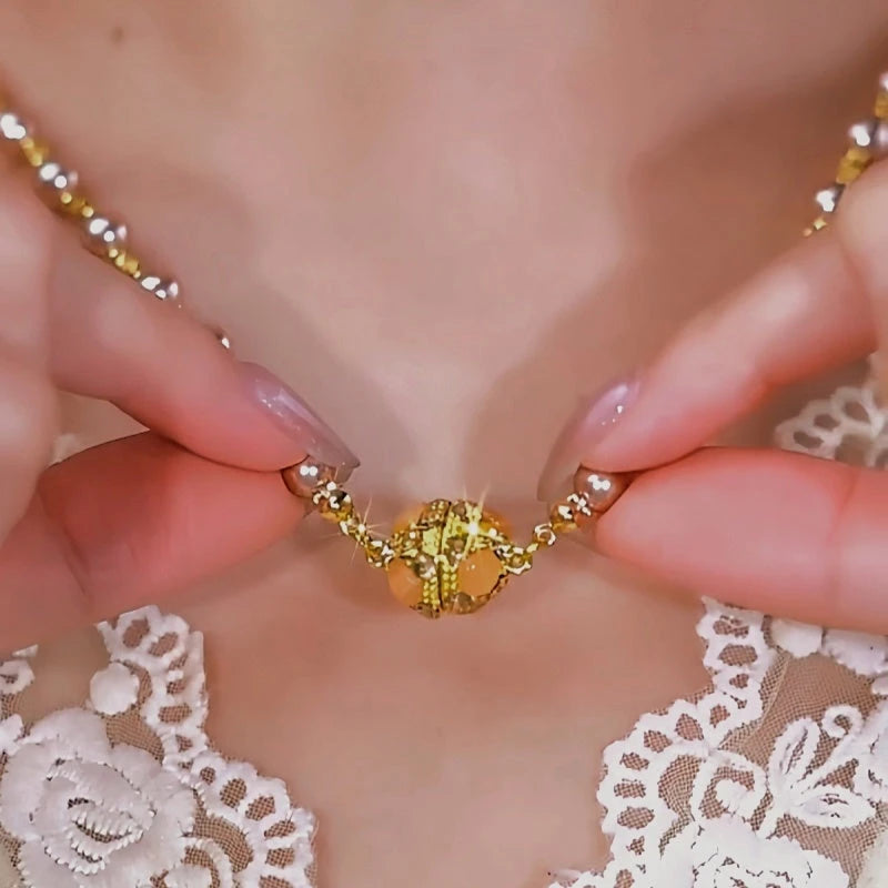 Close-up of the pendant and clasp on the Magnetic Pearl Necklace