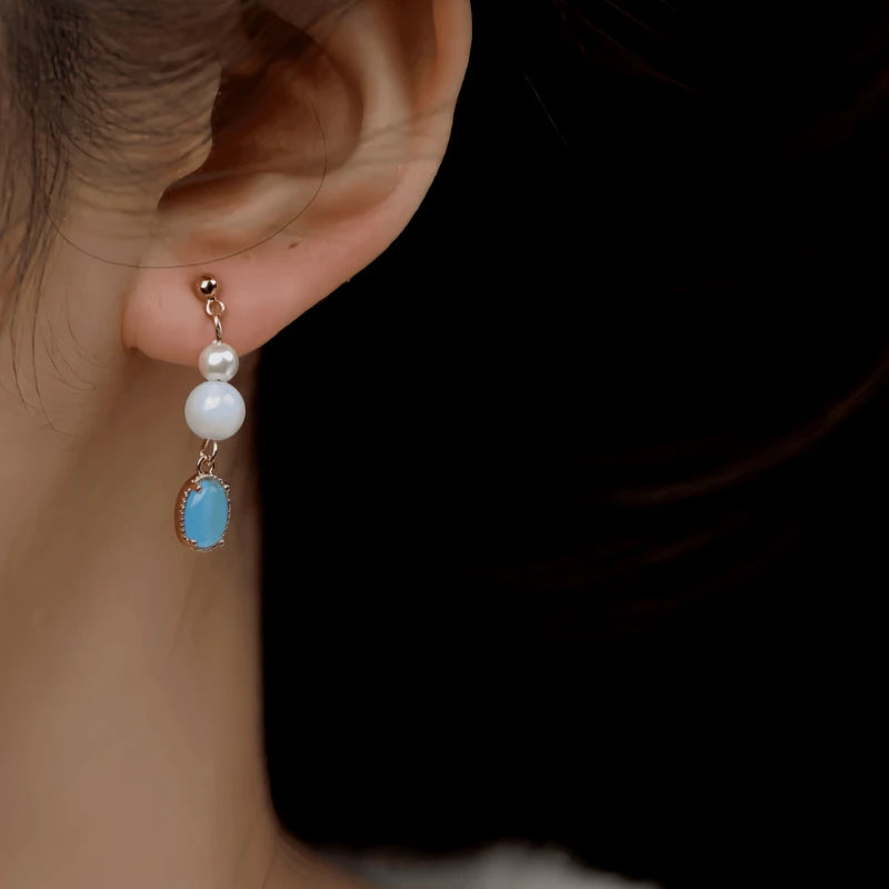 Close-up detail of the sparkling zircons and plating on the Pearl Bead Earrings