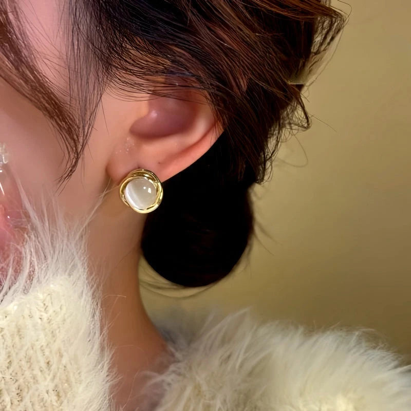 Close-up detail of the sparkling zircons and plating on the Cat's Eye Studs