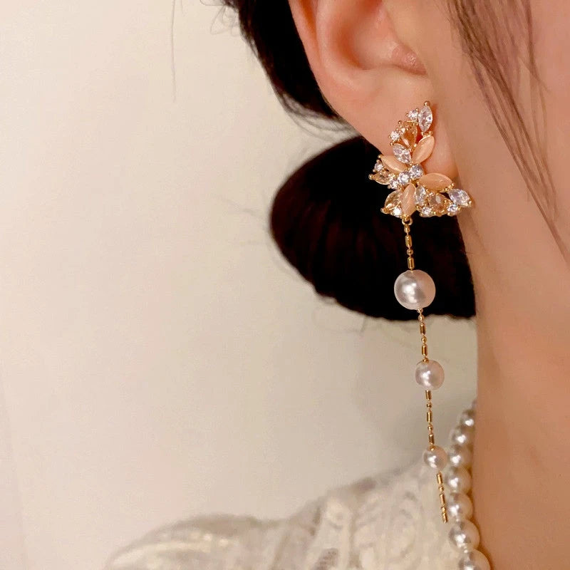 Close-up detail of the sparkling zircons and plating on the Butterfly Tassel Earrings