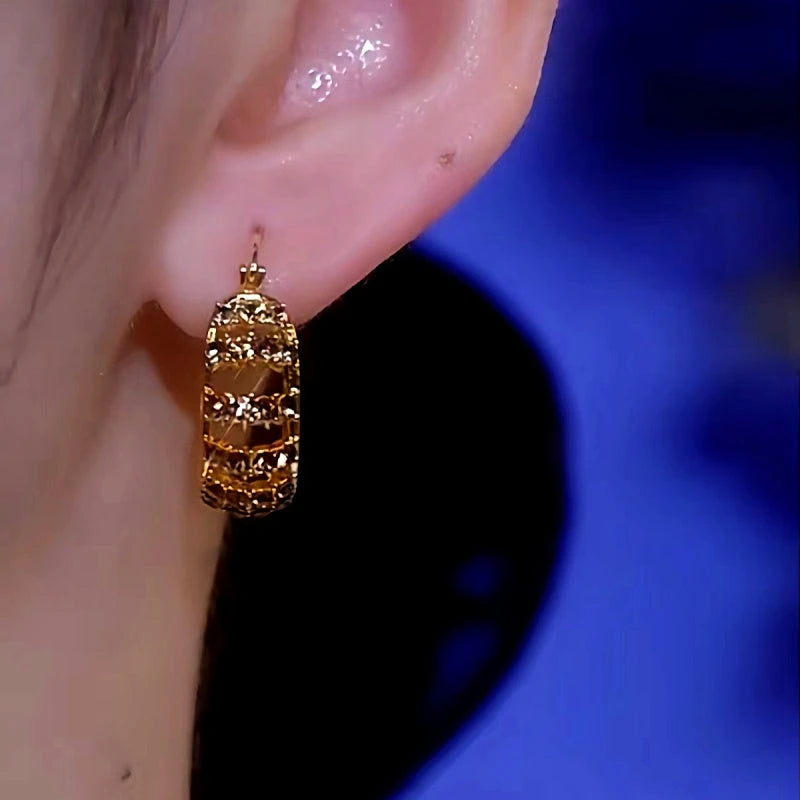 Close-up detail of the sparkling zircons and plating on the Brown Diamond Earrings